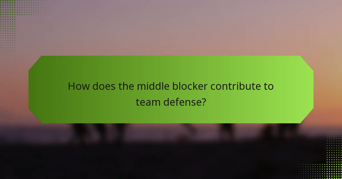 How does the middle blocker contribute to team defense?